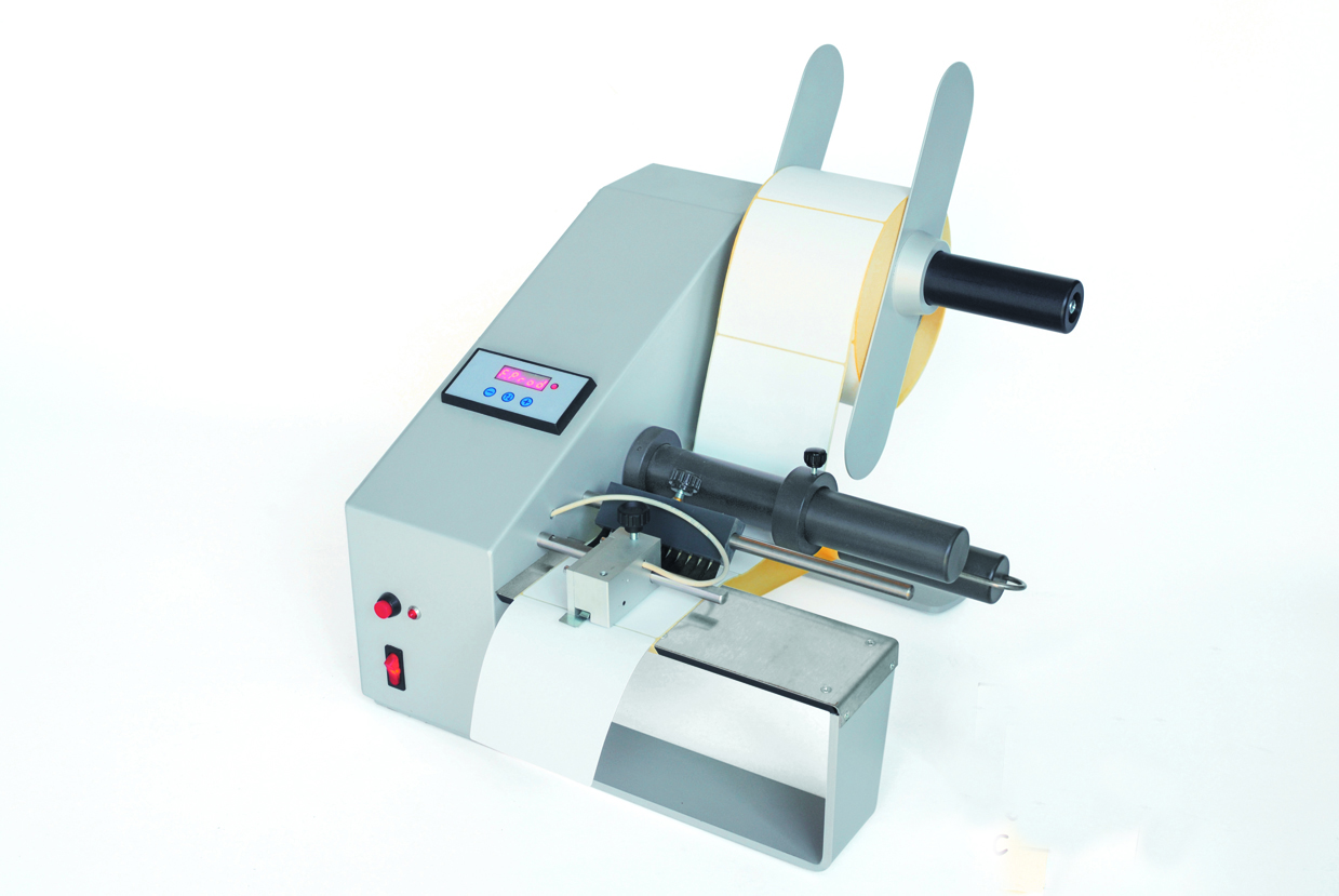 Dispenser for self-adhesive labels   